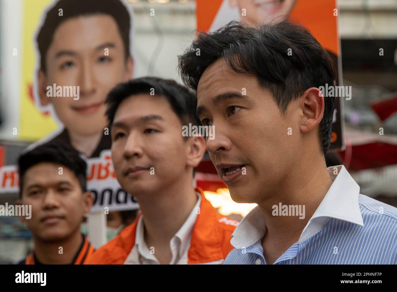 Bangkok, Bangkok, Thailand. 29th Mar, 2023. Move Forward party leader Pita Limjaroenrat (right) and local representative candidate Chalermchai Kulalert (center) canvasses for votes in a market in the Lat Prao district of the Thai capital Bangkok. Thailand's upcoming elections scheduled for May 14th, 2023 will be the nation's first general election since 2019. (Credit Image: © Adryel Talamantes/ZUMA Press Wire) EDITORIAL USAGE ONLY! Not for Commercial USAGE! Stock Photo