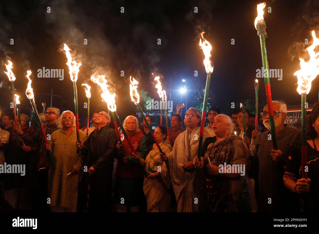Dhaka, Bangladesh - March 25, 2023: Anti-war crimes campaigners hold a