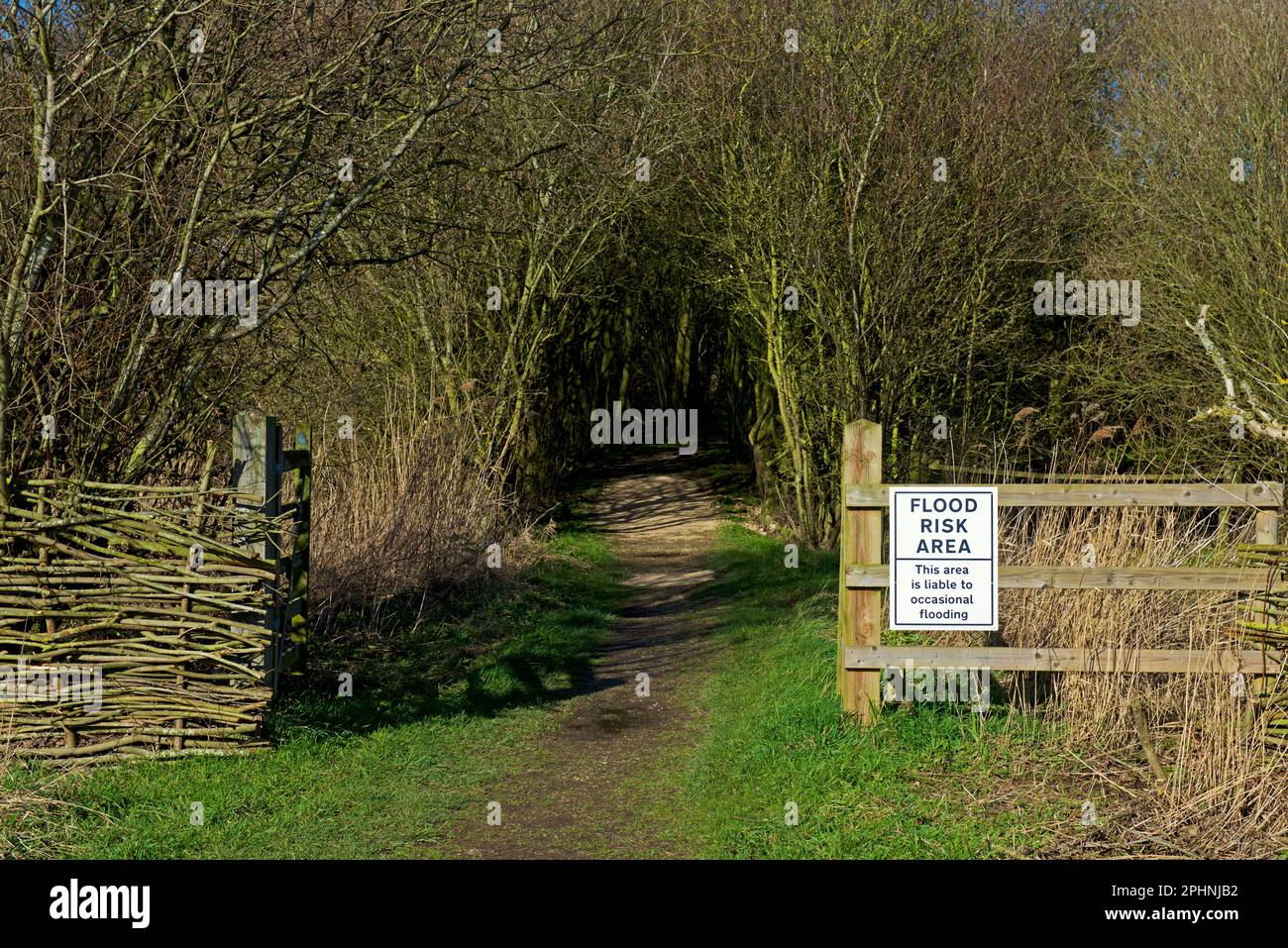 Sign warning about flooding at Blacktoft Sands, an RSPB nature reserve in East Yorkshire, England UK Stock Photo