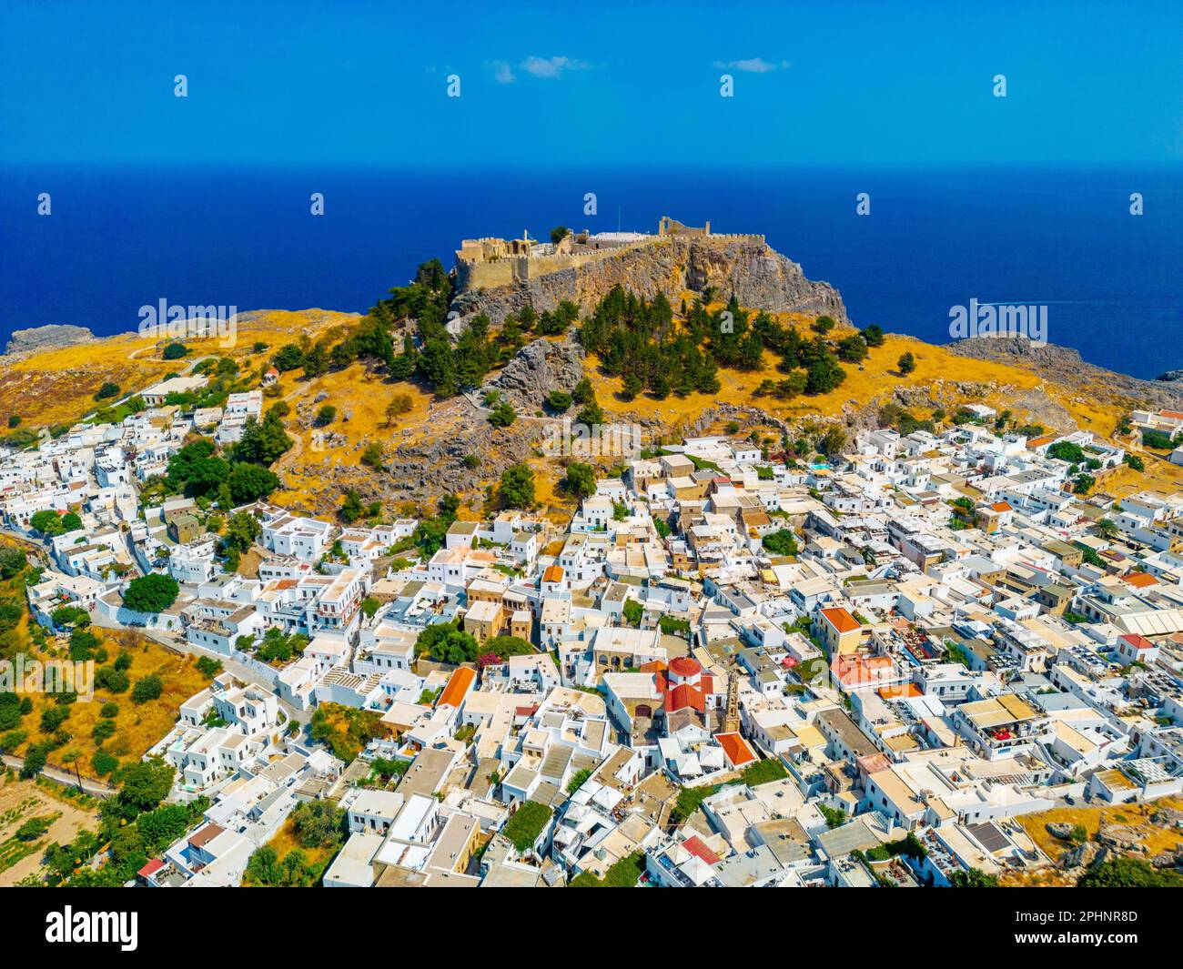 Lindos White Rodes Acropolis of Lindos overlooking traditional white houses at Rhodes ...