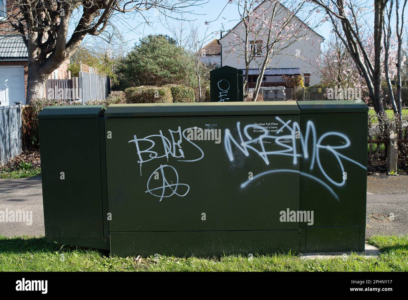 Slough, Berkshire, UK. 27th March, 2023. Graffiti on broadband communication box outside a house in Slough, Berkshire. In a bid to crack down further on anti social behaviour, the Government have announced new measures to punish graffiti artists and those causing anti social behaviour. Credit: Maureen McLean/Alamy Stock Photo