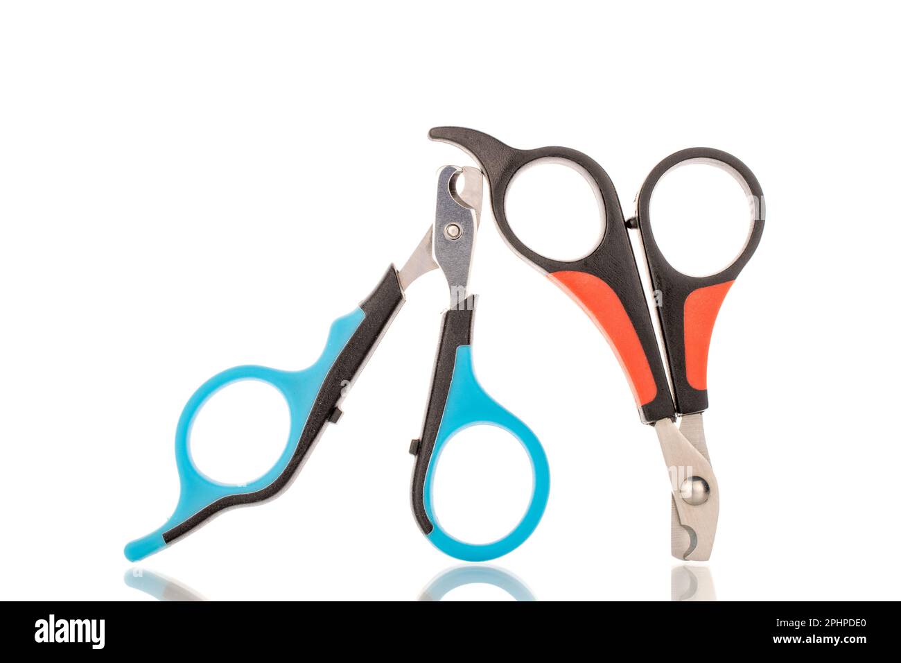 Two dog scissors, for trimming the claws, closeup, isolated on a white