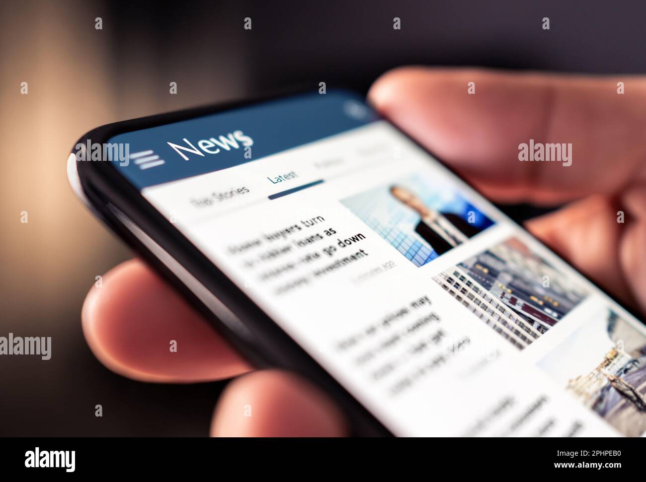 News online in phone. Reading newspaper from website. Digital publication and magazine mockup. Press feed with latest headlines in digital web portal. Stock Photo