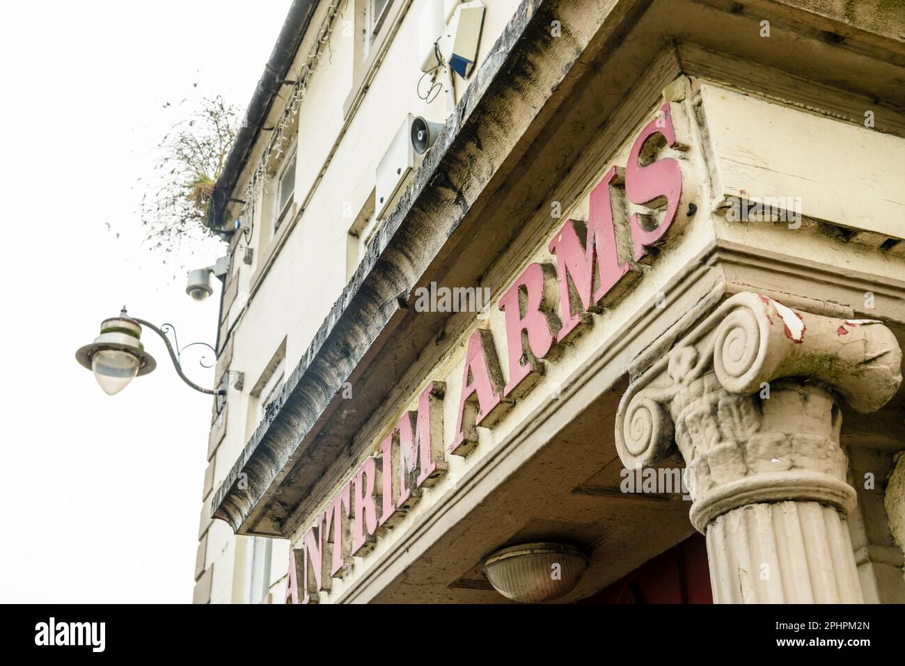 Sign above the entrance of the Antrim Arms Hotel, now derelict, Ballymoney, Northern Ireland Stock Photo