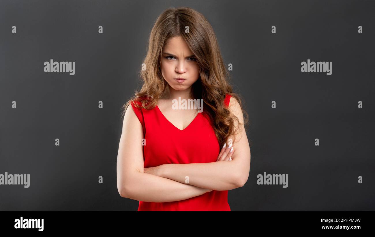 Woman arms folded annoyed hi-res stock photography and images - Alamy