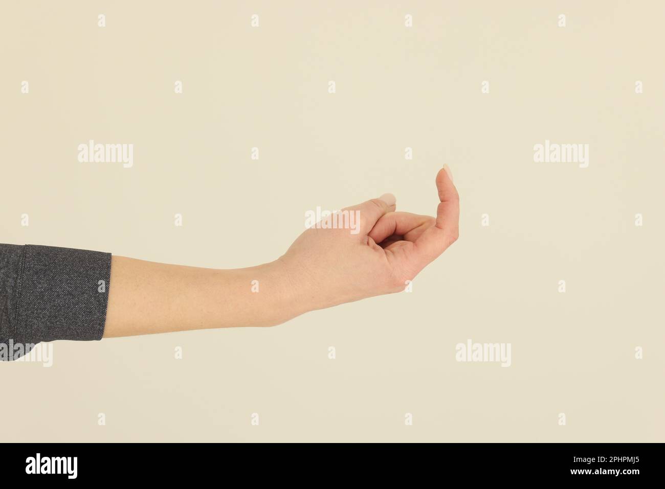 Woman making beckoning gesture hi-res stock photography and images - Alamy