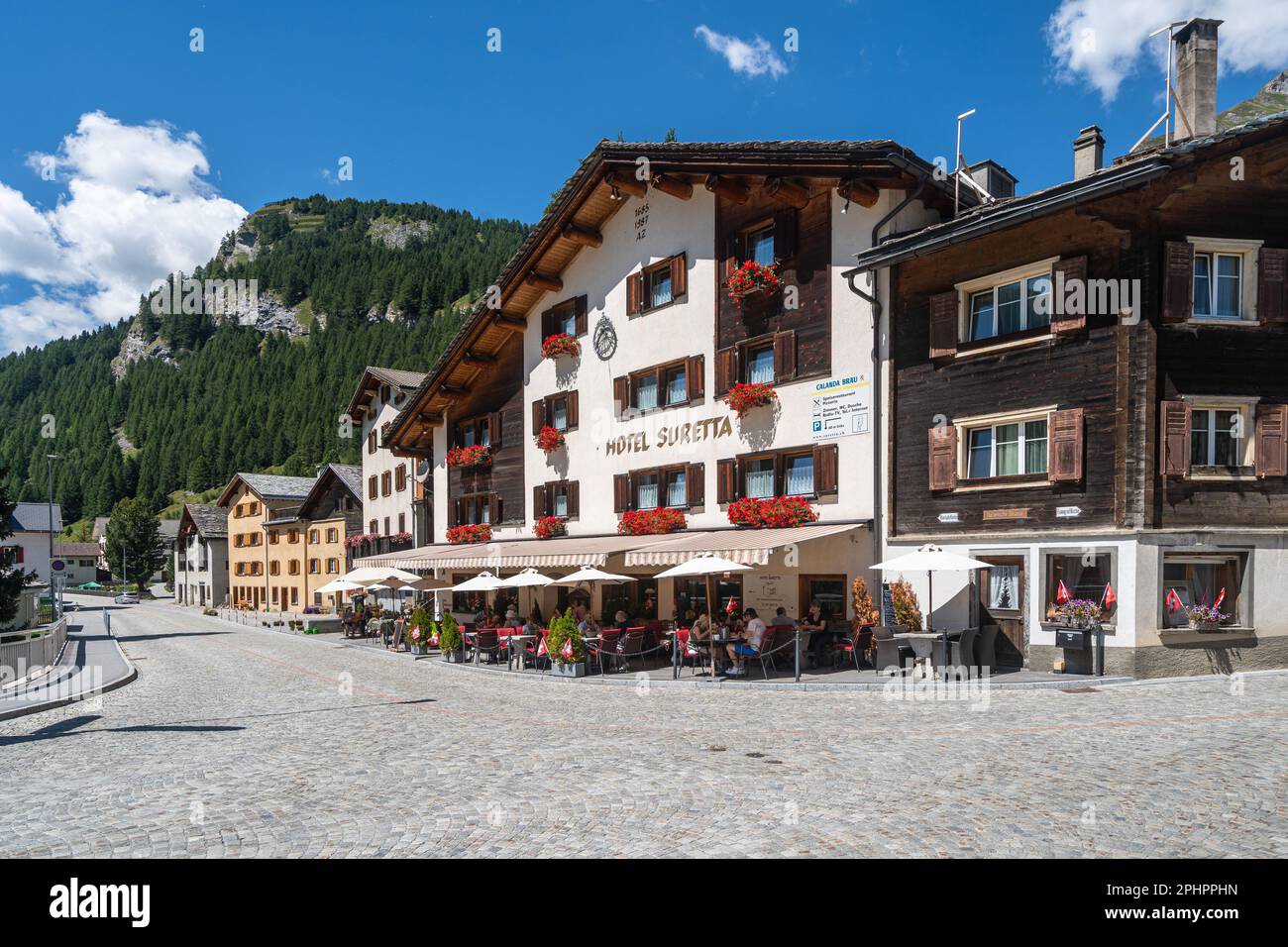 View of Splugen, a picturesque alpine village in Canton Grisons during summer season. Splugen, Switzerland, Aug. 2022 Stock Photo