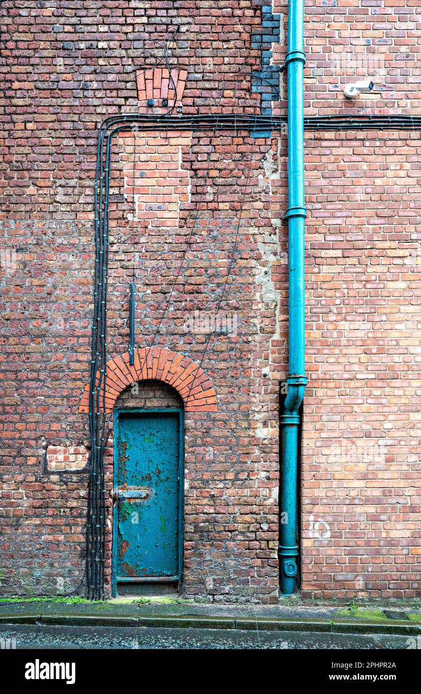 Steel doors to Liverpool dockland warehouse Stock Photo