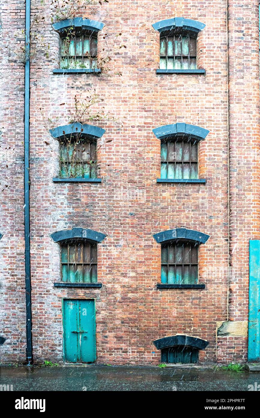 Steel doors to Liverpool dockland warehouse Stock Photo