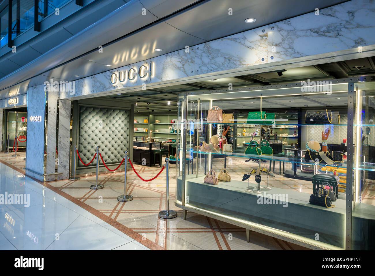 Gucci storefront/shop window/visual merchandising of New Bond St store, and  upmarket, affluent, upscale, luxury business Stock Photo - Alamy
