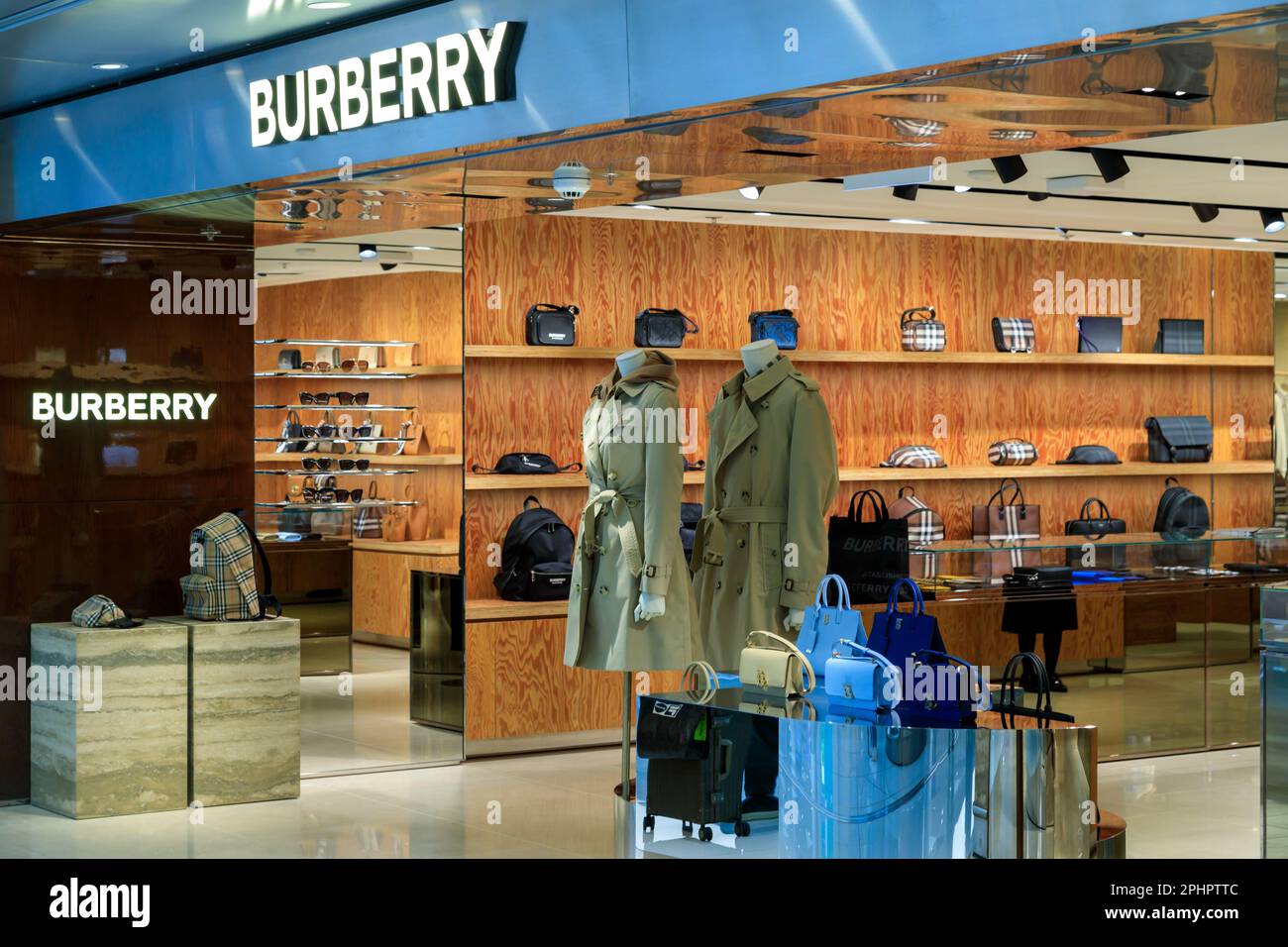 Hong Kong - February 28, 2023: Exterior of a luxury brand name retail store in the departure lounge of the Hong Kong International airport. Stock Photo
