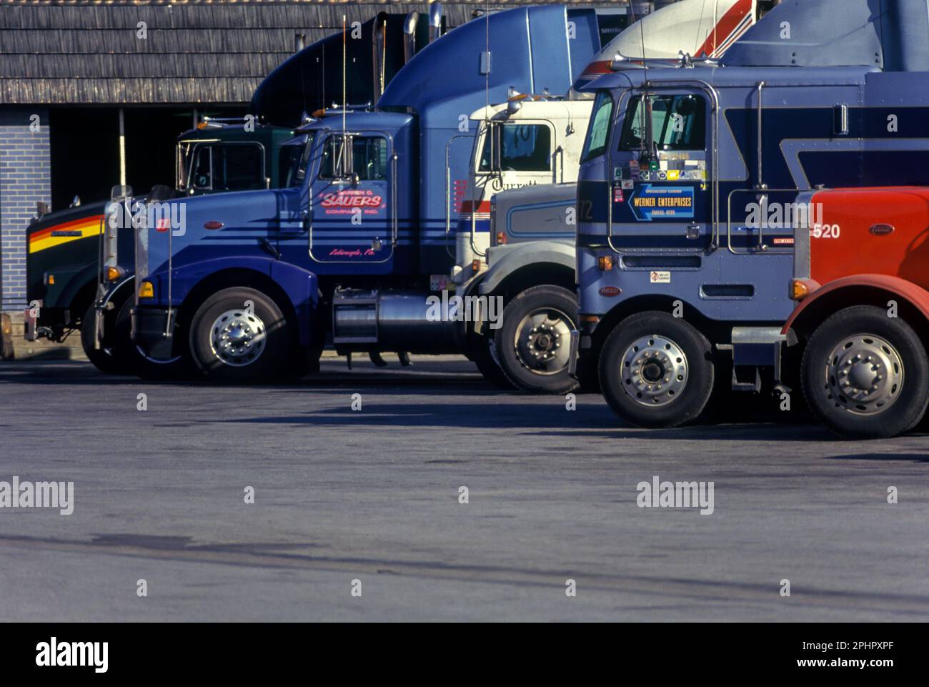 1991 HISTORICAL LINE OF PARKED DIESEL TRUCKS AT AMERICAN TRUCK STOP
