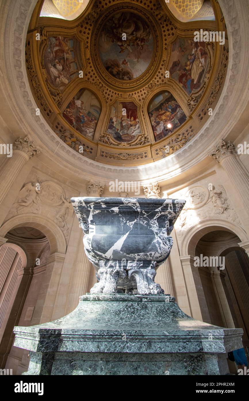 A magnificent sculpture set within an impressive church in Paris, France Stock Photo