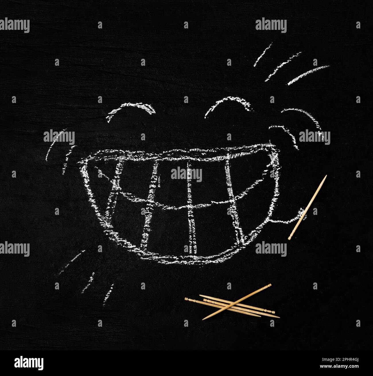 Chalked Smile with Wooden Toothpicks on Black Background, Drawn