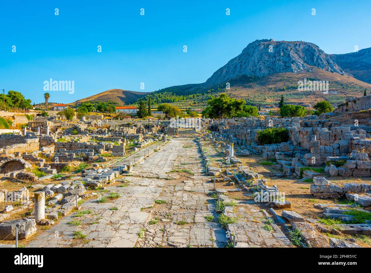 Lechaion Road at Ancient Corinth archaeological site in Greece. Stock Photo