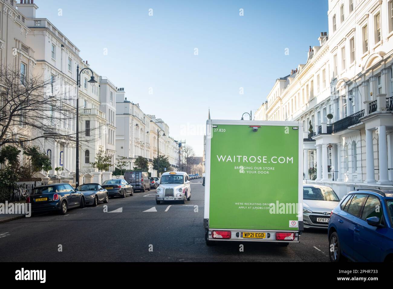 London- January 2023: Waitrose delivery van in Holland Park, West London Stock Photo