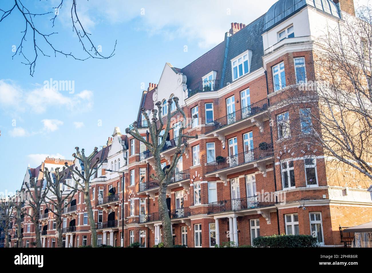 London- January 2023: Red brick Victorian houses on Elgin Avenue in W9 Maida Vale Stock Photo