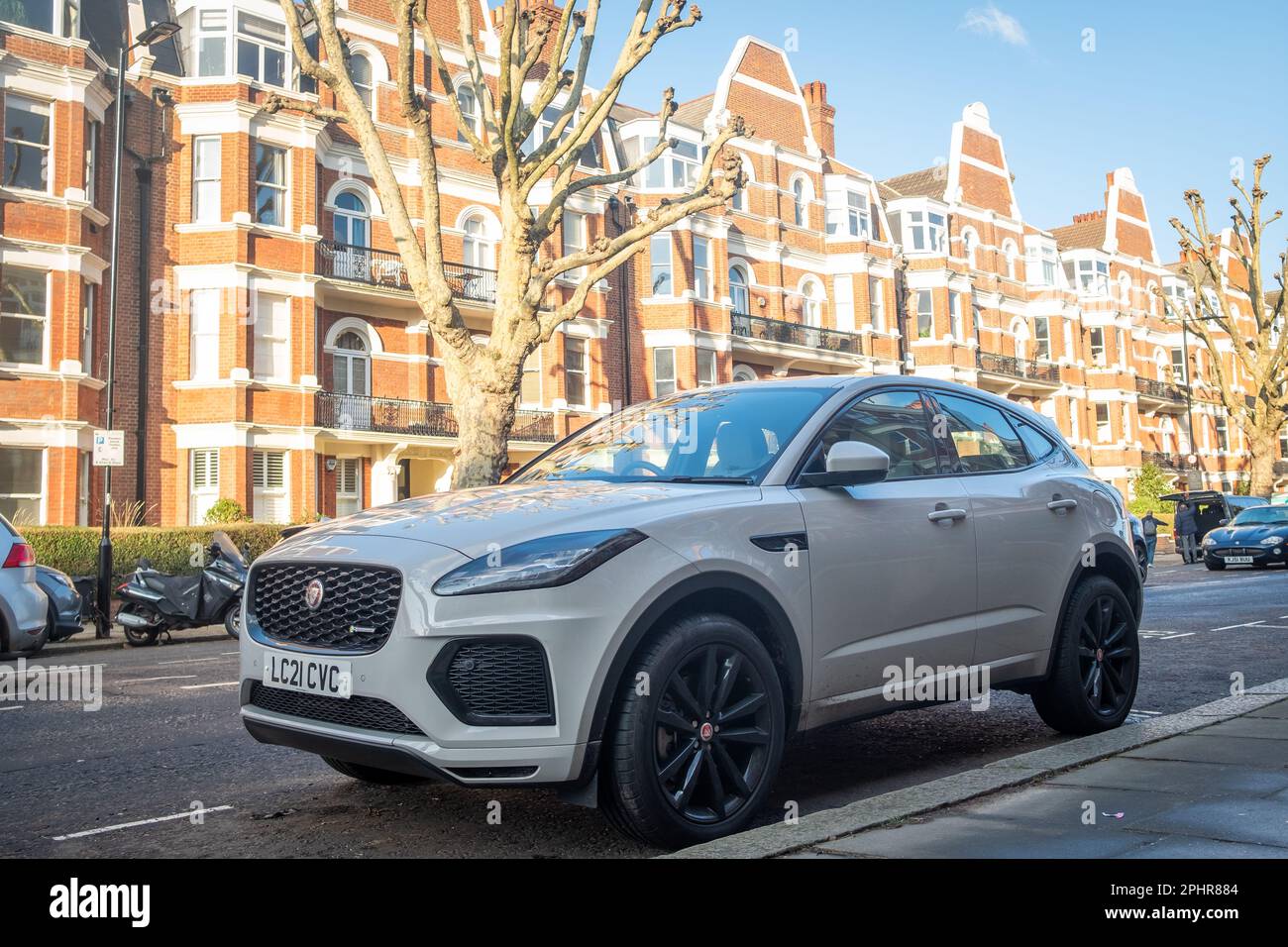 London- January 2023: Jaguar E Pace electric SUV car parked on residential street in Maida Vale Stock Photo