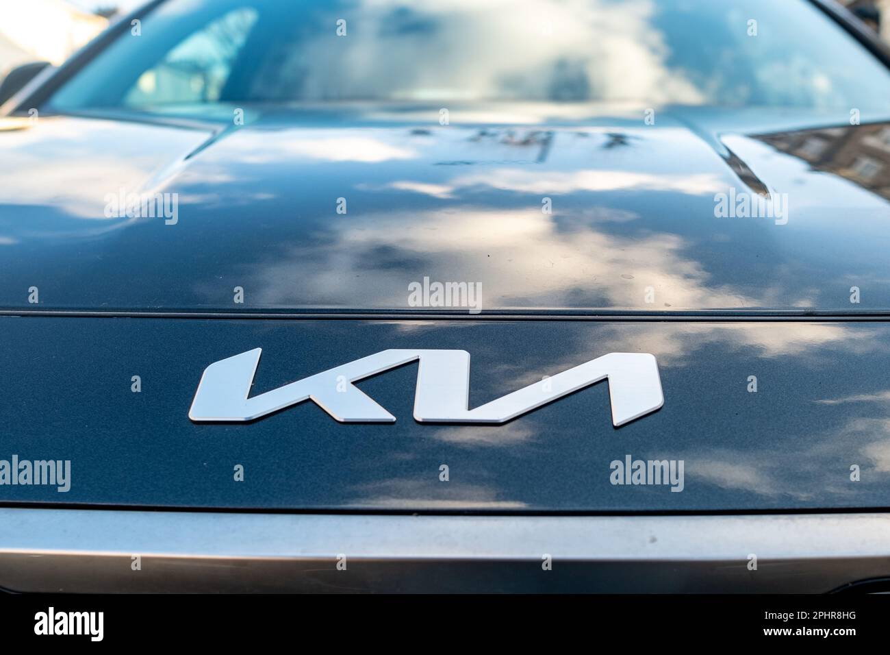 London- January 2023: Kia car logo on front of car- Korean car manufacturer Stock Photo