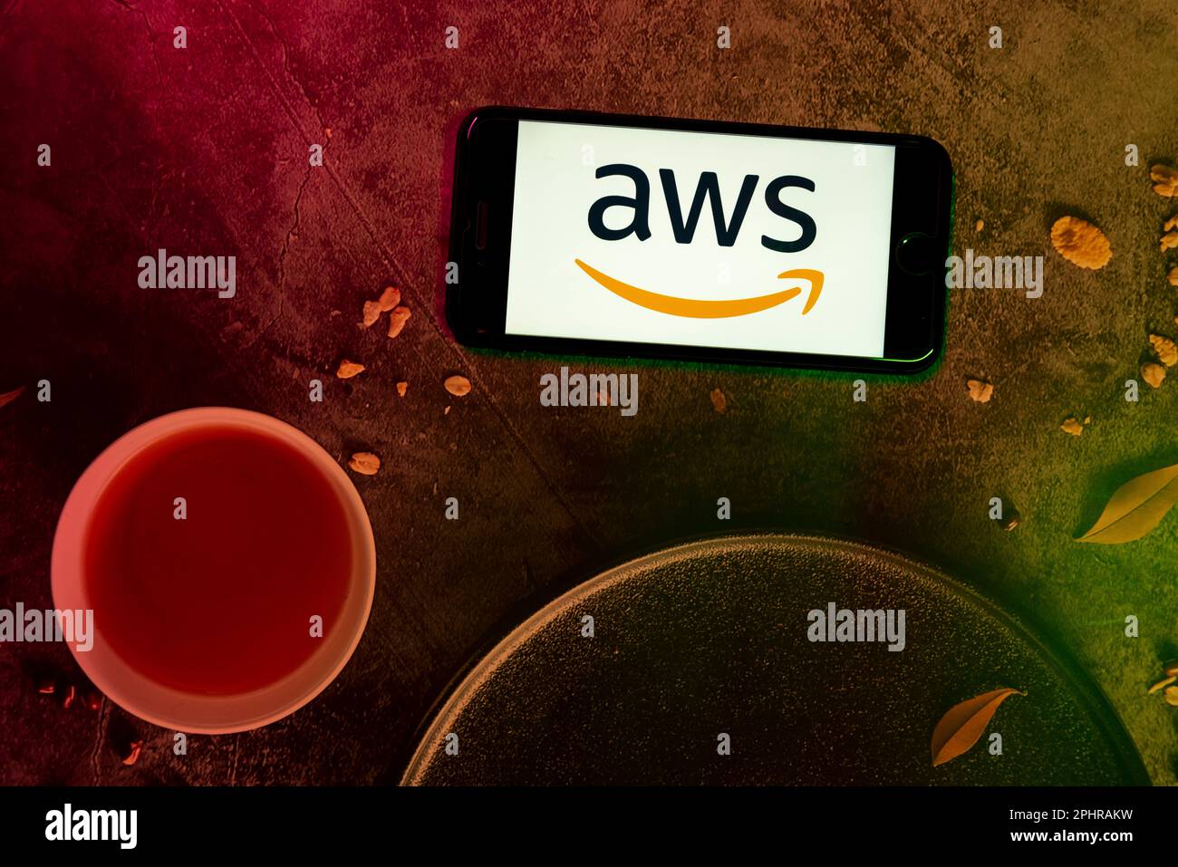 In this photo illustration, the AWS (amazon web service) logo is seen displayed on a mobile phone screen. Stock Photo