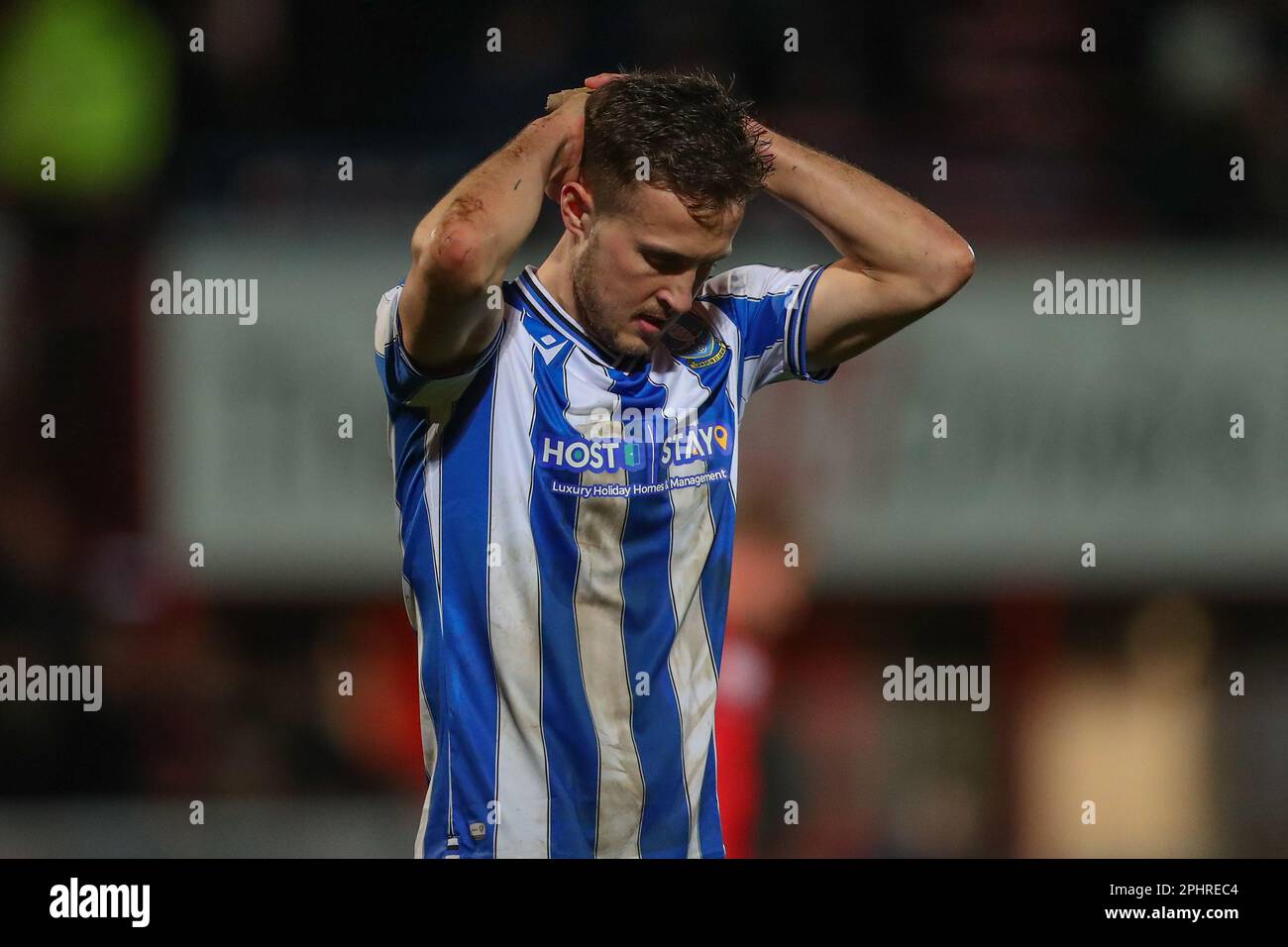 Cheltenham, UK. 29th Mar, 2023. Will Vaulks #4 of Sheffield Wednesday looks dejected after the final whistle in the Sky Bet League 1 match Cheltenham Town vs Sheffield Wednesday at The Completely-Suzuki Stadium, Cheltenham, United Kingdom, 29th March 2023 (Photo by Gareth Evans/News Images) in Cheltenham, United Kingdom on 3/29/2023. (Photo by Gareth Evans/News Images/Sipa USA) Credit: Sipa USA/Alamy Live News Stock Photo