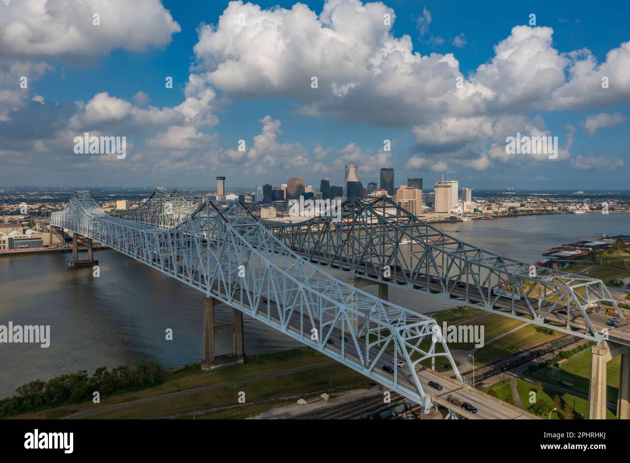 An aerial picture of New Orlean bridges across the Mississippi river in Louisiana with a city skyline Stock Photo