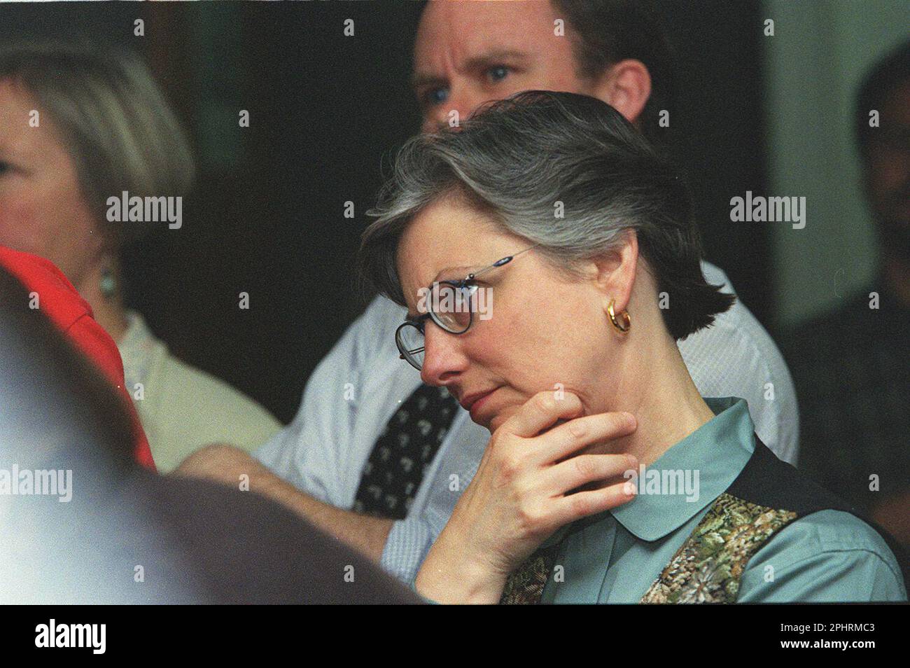 SALE18C-C-17MAR00-MN-LS -----Pam Reasner listens as Examiner Publisher and  Editor Tim White announces the sale of the Examiner in the Examiner  newsroom. Ted Fang of the SF Independent has bought the Examiner. CHRONICLE