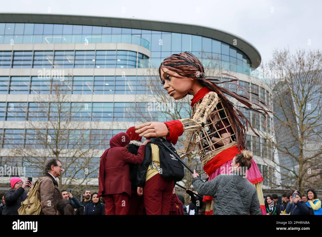 London, UK. 29 March 2023. Giant puppet Little Amal walks around the
