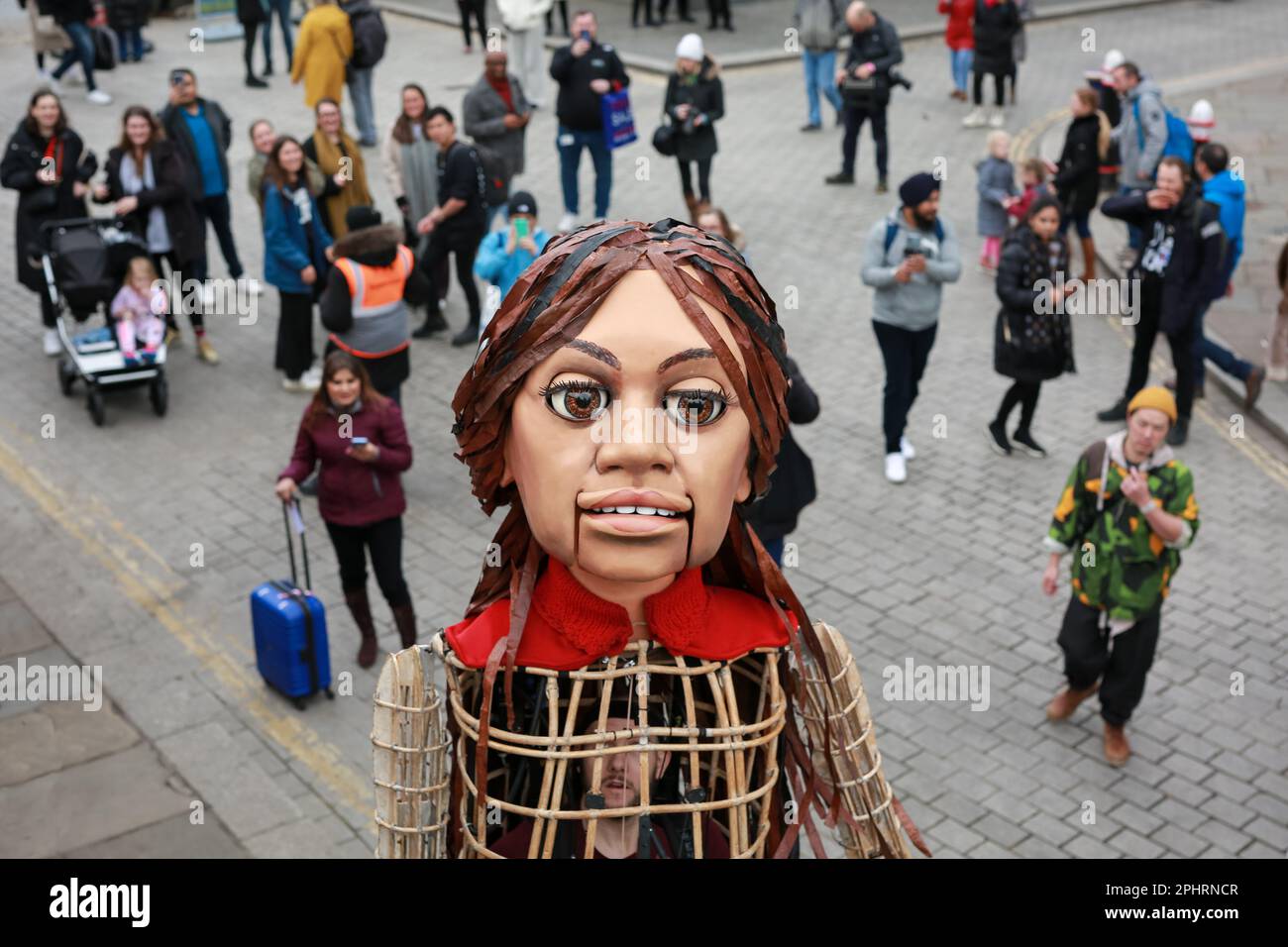 London, UK. 29 March 2023. Giant puppet Little Amal walks around the