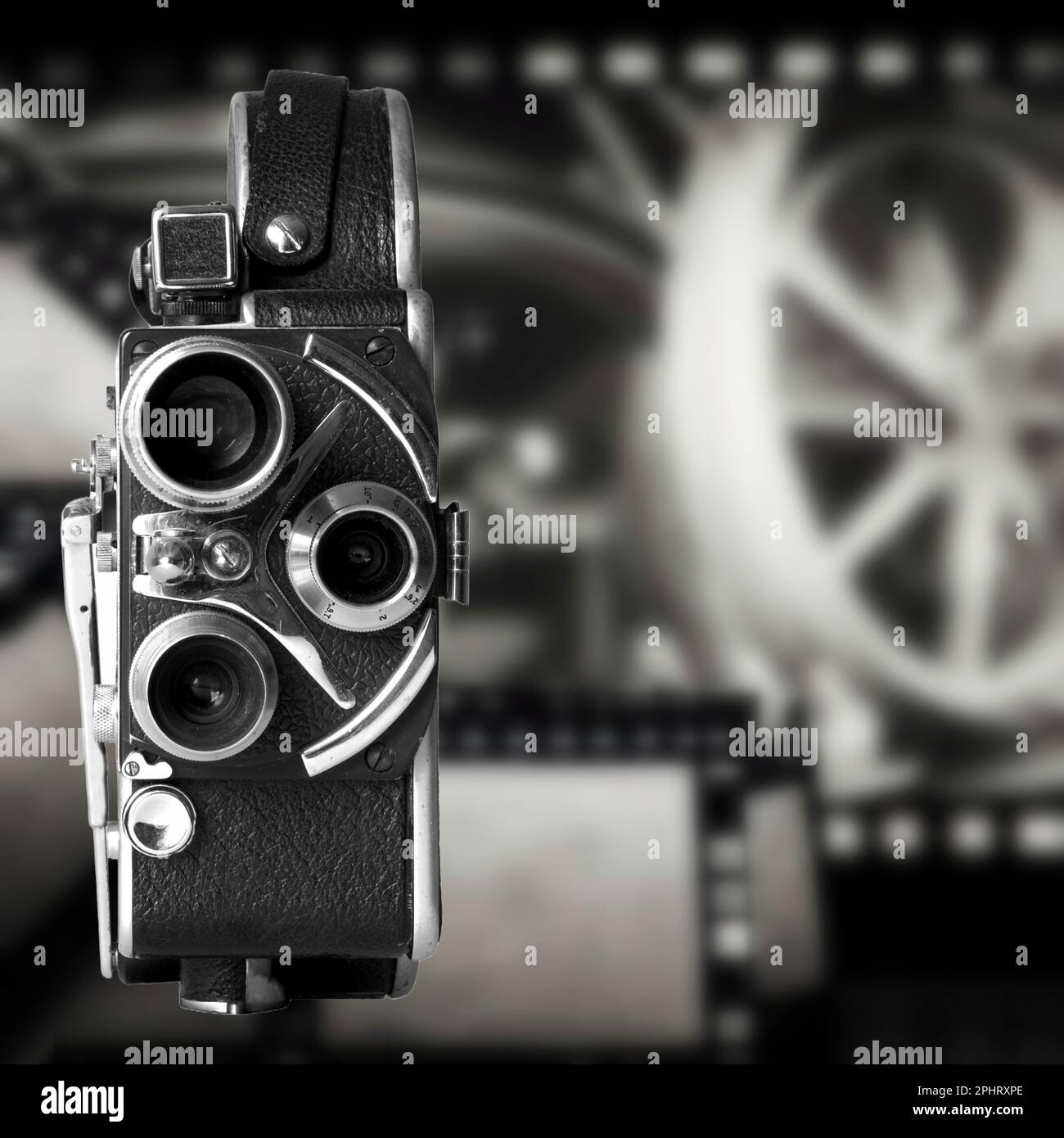A Vintage Video Camera on the background of old films Stock Photo