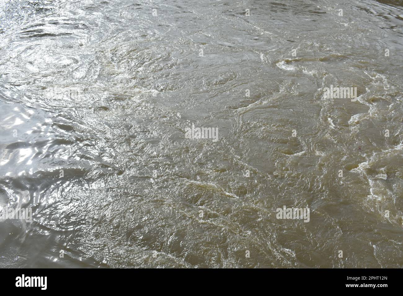 Swirling floodwaters on the Neosho River, also known as the Grand River, in Fort Gibson, Oklahoma, OK, United States, US, USA. Stock Photo