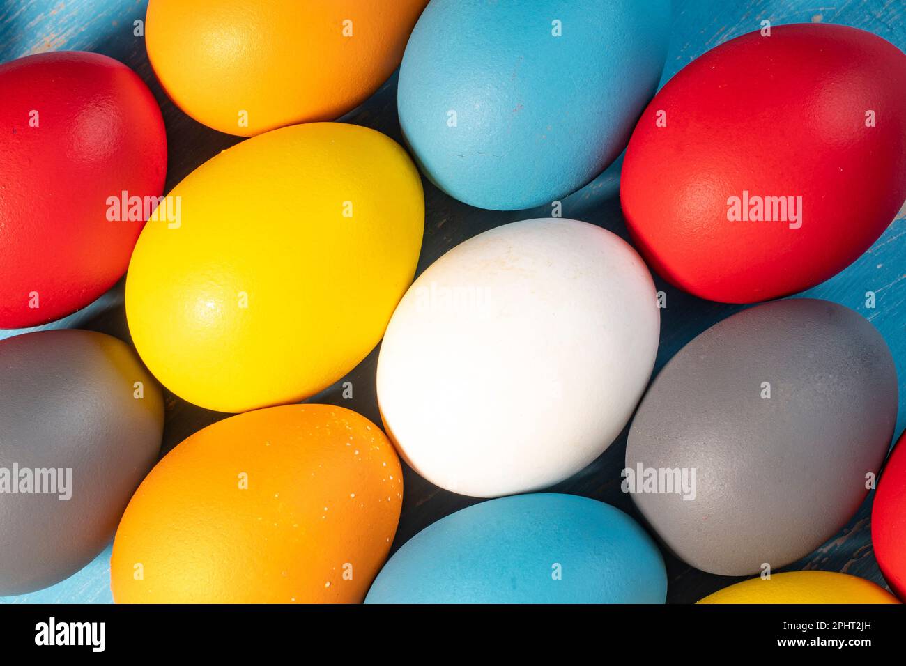 eggs painted in different colors to symbolize the passage of Christian