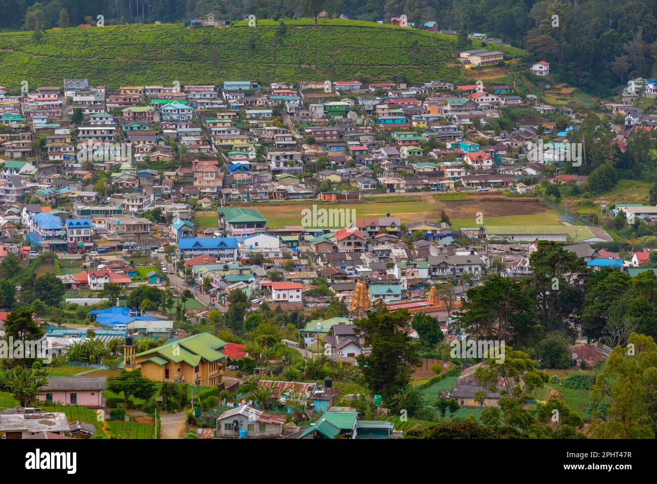 Hilly landscape of Sri Lanka dotted with villages and tea plantations ...