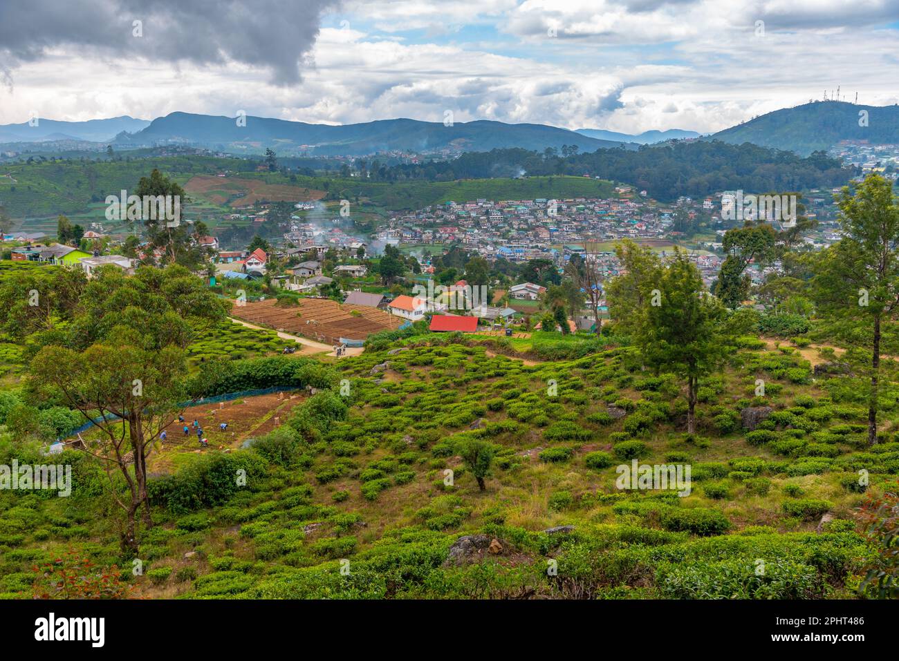 Hilly landscape of Sri Lanka dotted with villages and tea plantations ...