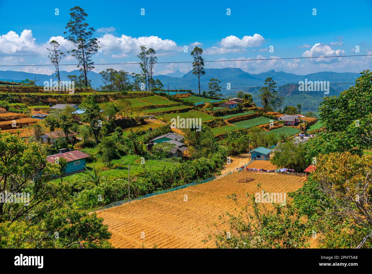 Hilly landscape of Sri Lanka dotted with villages and tea plantations ...
