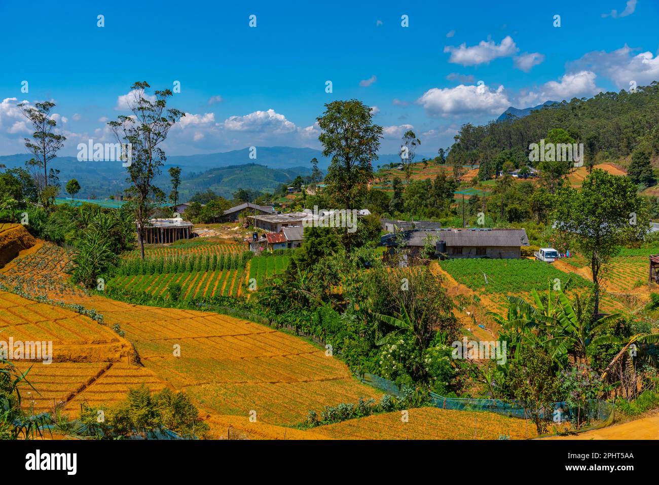 Hilly landscape of Sri Lanka dotted with villages and tea plantations ...