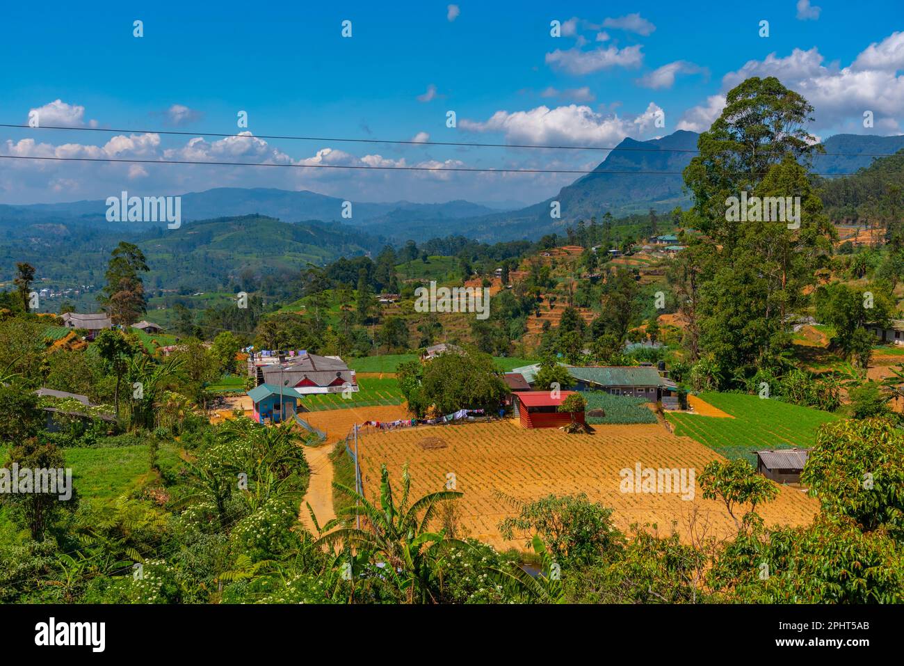 Hilly landscape of Sri Lanka dotted with villages and tea plantations ...