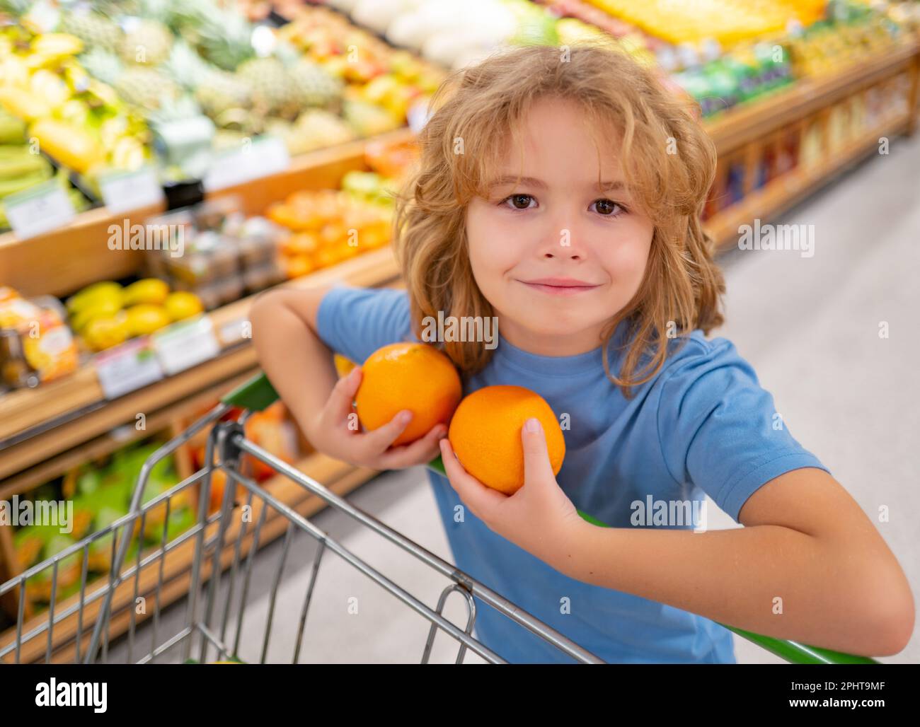 Budva, Montenegro - 17 march 2021: A child with a small trolley in the  supermarket, go shopping with his mother. The family goes shopping Stock  Photo - Alamy