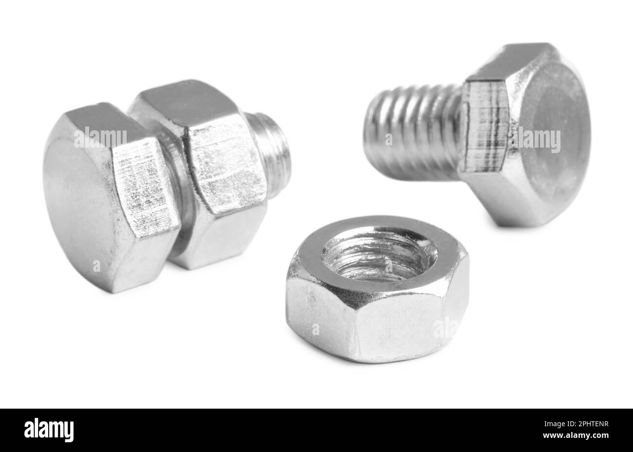 Metal bolts with hex nuts on white background Stock Photo Alamy