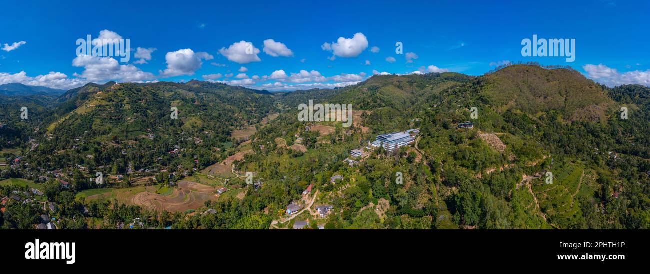 Hilly landscape of Sri Lanka dotted with villages and tea plantations ...