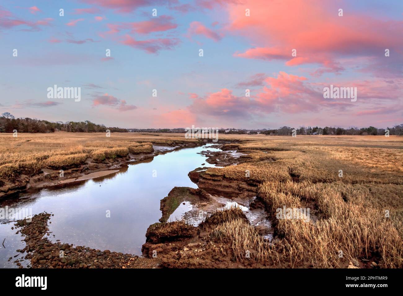 Sunset sky over the marsh and Sesuit Creek in East Dennis in winter Stock Photo