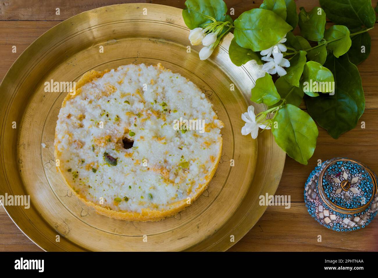 Ghewar or ghevar is a traditional sweet of rajasthan. It is made of