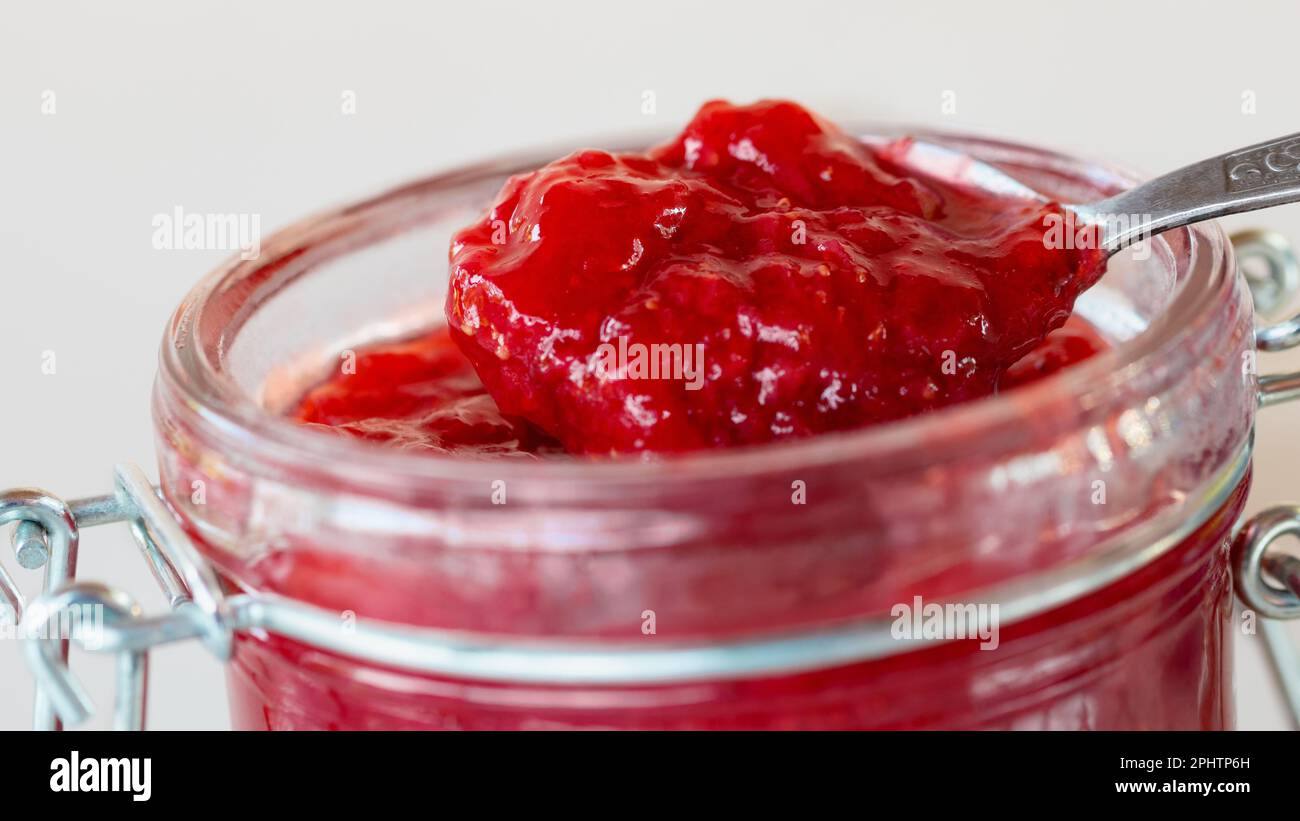 Strawberry jam in a glass jar hi-res stock photography and images - Alamy