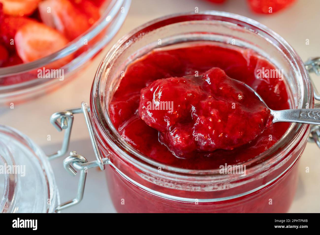 Preparation and preservation of strawberry jam in a glass jar Stock Photo Alamy