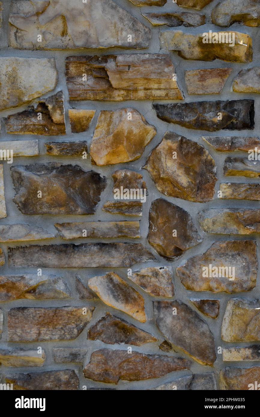 Large stone and mortar rock column Stock Photo