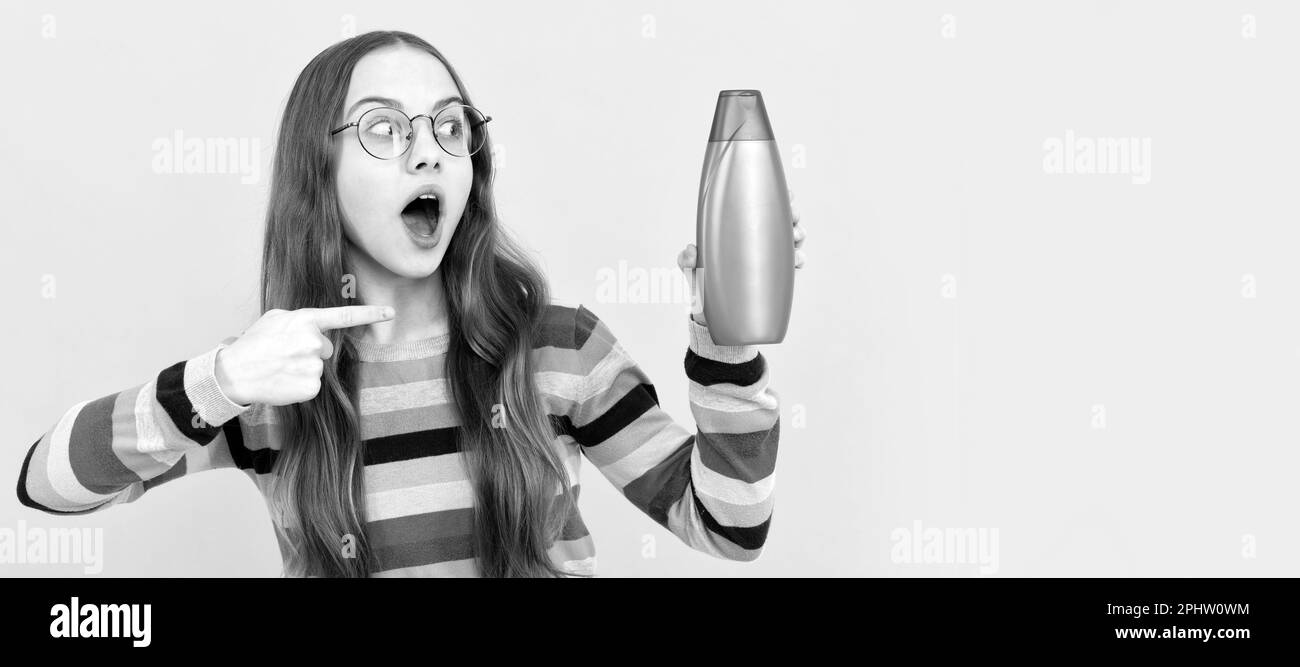 child with hair conditioner. daily habits and personal care. skin care