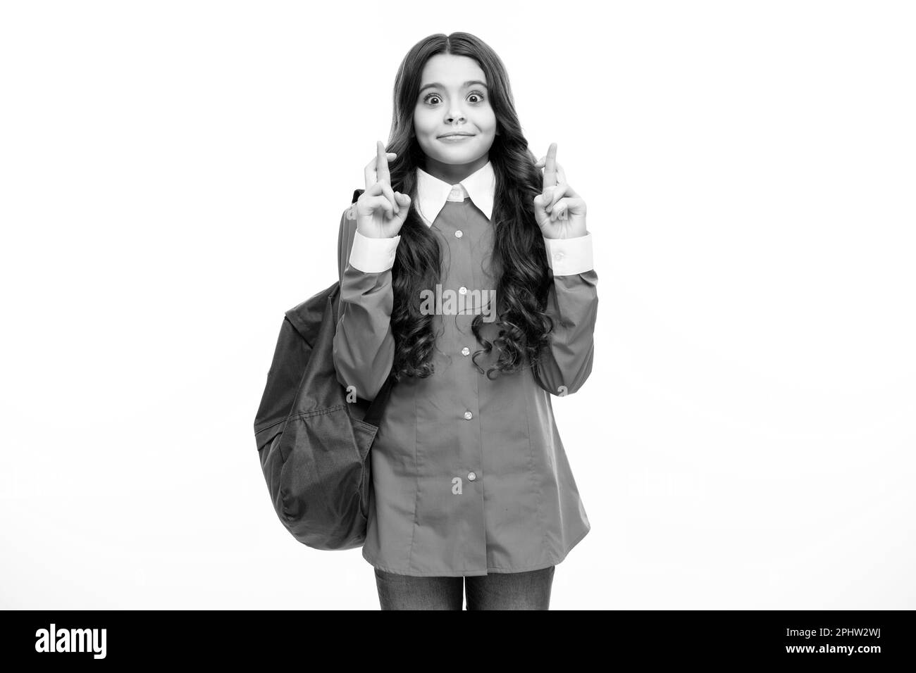 Schoolgirl in school uniform with school bag. Schoolchild, teen student