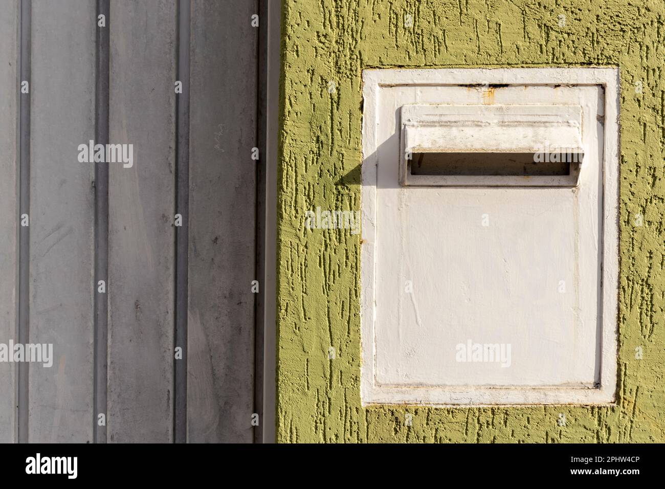 Metal mail box on the rough wall in Brazil Stock Photo Alamy