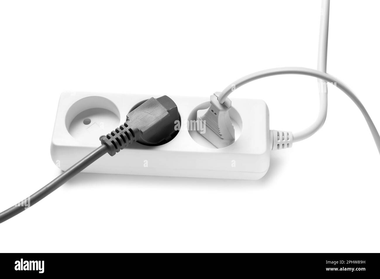 Electric extension cord with plugs isolated on white background Stock Photo