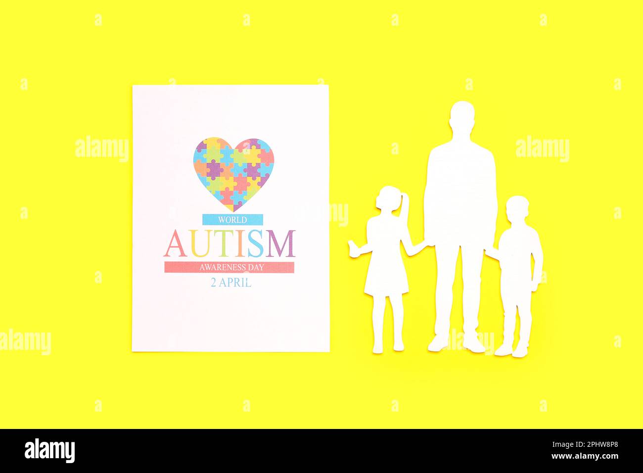 Card for World Autism Awareness Day and family figure on yellow ...